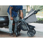 Chicco Bravo LE Trio Travel System with Baby Carrier (Driftwood)